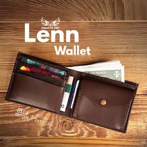 Puede incluir: Cartera de cuero marrón abierta con tarjetas y efectivo visibles. La cartera está sobre una superficie de madera. El texto "Lenn Wallet" se muestra en blanco.