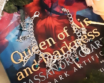 De Dark Artifices geïnspireerde metalen bedelarmband