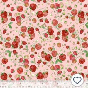 May include: A fabric with a repeating pattern of red strawberries, green leaves, and white flowers on a light pink background. The strawberries vary in size and are scattered across the fabric. A ruler is at the bottom.