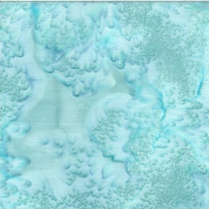 May include: A seamless fabric with a watercolor-like design. The pattern features a blend of light and medium shades of blue and teal, creating a soft, textured appearance. The design has a cloudy, organic feel, with areas of lighter color blending into darker, textured sections.