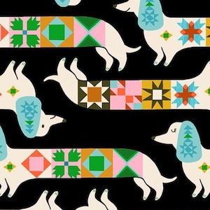 May include: A repeating pattern on a black background featuring cream-colored dachshunds with elongated bodies. Each dog displays a series of colorful geometric quilt-like blocks in shades of pink, green, orange, and blue, with light blue ears.