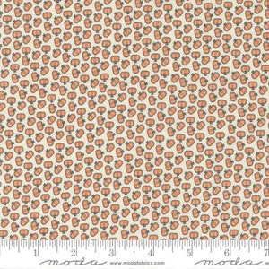May include: A white fabric with a repeating pattern of small orange pumpkins. The fabric is 44 inches wide and is perfect for quilting, crafts, and home decor projects.