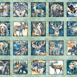 May include: A fabric panel featuring a collection of wildlife illustrations. The images include a wolf, deer, bear, eagle, and moose, set against a blue and brown watercolor background. The artwork is framed within a green border.