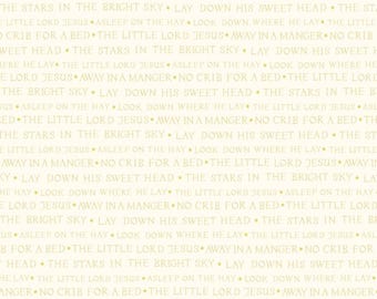 May include: Cream-colored fabric with a repeating pattern of text in a light brown color. The text includes phrases like "The Little Lord Jesus" and "Away in a Manger".