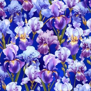May include: A vibrant floral pattern featuring irises in shades of purple, lavender, and white against a deep blue background. The flowers have yellow centers and green stems, creating a colorful and detailed design.