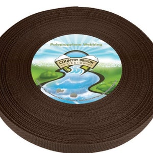 May include: A roll of brown polypropylene webbing. The label reads "Polypropylene Webbing" and "Country Brook Design".