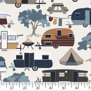 May include: A fabric pattern featuring various camping trailers, tents, picnic tables, and trees on a cream background. A clothesline with hanging garments and a campfire are also visible. A ruler at the bottom shows 7 inches of length.