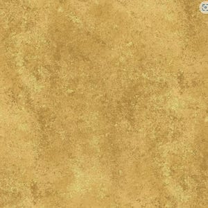 May include: A square-shaped piece of fabric or material featuring a solid mustard yellow color with a mottled, distressed texture. The surface displays variations in tone, creating a weathered appearance across the entire flat, uniform plane.