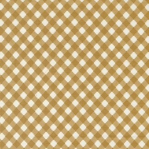 May include: A close-up of a fabric with a repeating pattern of gold and white diamonds. The diamonds are arranged in a grid-like fashion, creating a checkered design. The fabric has a slightly textured appearance.