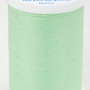 May include: A spool of light green Coats Dual Duty XP All Purpose thread. The spool is labeled with 250 yards and 229 meters. The label also says "Fil Tout Usage" and "Hilo para uso general".
