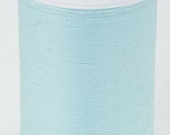 May include: A spool of light blue Coats Dual Duty XP All Purpose thread. The spool is labeled with 250 yards (229 meters) and says "Fil Tout Usage" and "Hilo para uso general".