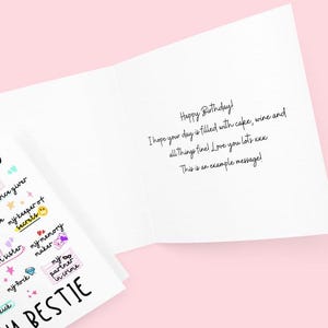 May include: A pink and white birthday card with a colourful illustration of a best friend. The card reads "Happy Birthday! I hope your day is filled with cake, wine and all things fine! Love you lots xxx This is an example message!"