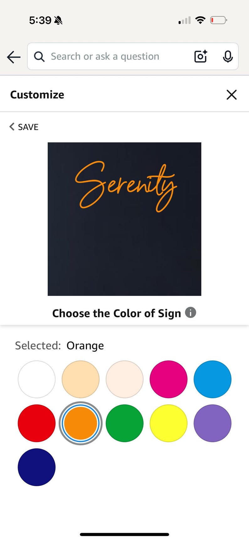 May include: A digital product customisation screen. The word "Serenity" is displayed in orange script on a dark background. Below, colour options are shown, with orange selected. The text "Choose the Colour of Sign" is also visible.