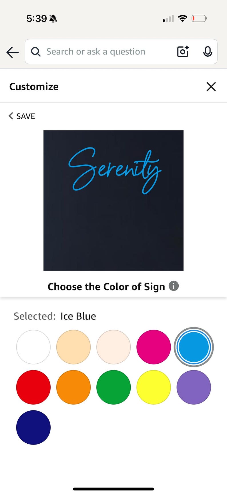 May include: A digital display showing a customizable sign with the word "Serenity" in ice blue script on a dark background. Colour options are displayed below the sign.