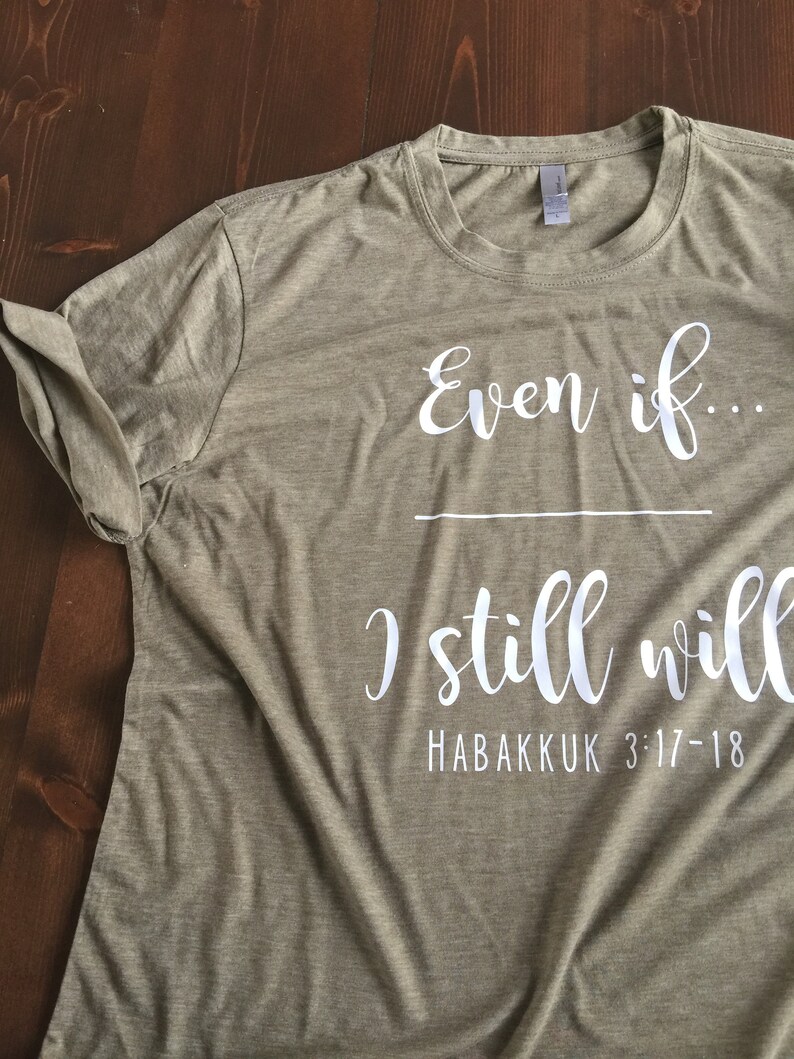 May include: A green t-shirt with the text "Even if... I still will" and "Habakkuk 3:17-18" printed in white.