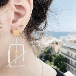 Unique statement handmade silver and gold earrings