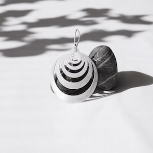 Long silver geometric and minimal circle chandelier earrings