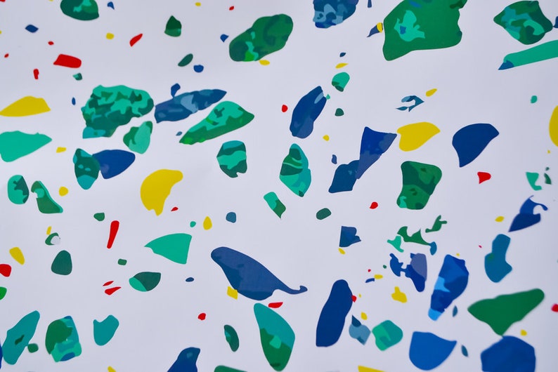 May include: Abstract pattern with blue, green, yellow, and red splotches on a white background.