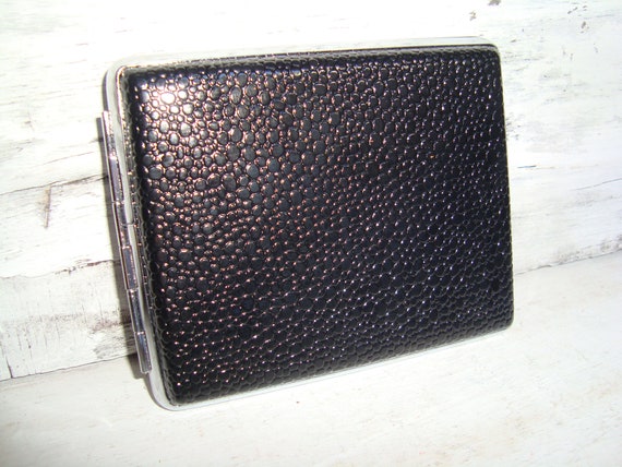 elfbar nachfüll pod läuft aus Etui cigarette Homme Luxe main image 1