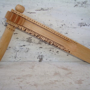 Noise maker, Wooden noise maker, Wooden football rattle, Sports equipment, Ratchet toy, Vintage toy, Flapper and jester toy, Party toy