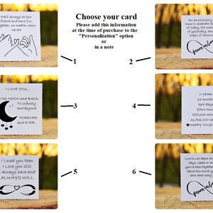 May include: A set of ten different cards with various romantic messages and illustrations. The cards feature designs such as intertwined fingers, a crescent moon, an infinity symbol, and a heart. The cards are printed on white paper with black ink.
