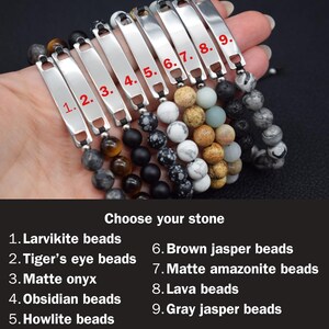 May include: Nine bracelets featuring silver-toned metal bars numbered 1 to 9, paired with various natural stone beads including larvikite, tiger's eye, matte onyx, obsidian, howlite, brown jasper, matte amazonite, lava, and grey jasper.