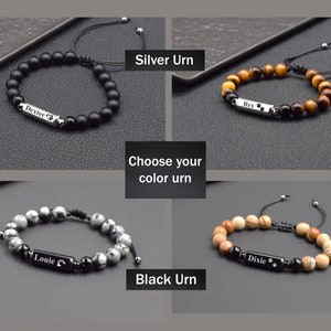 May include: Four different styles of beaded bracelets with personalised nameplates. The bracelets are made with black onyx, tiger's eye, and white and brown stones. The nameplates are engraved with the names "Dexter", "Rex", "Louie", and "Dixie".