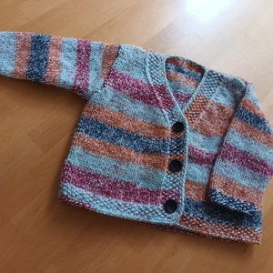 Knitted toddler cardigan.