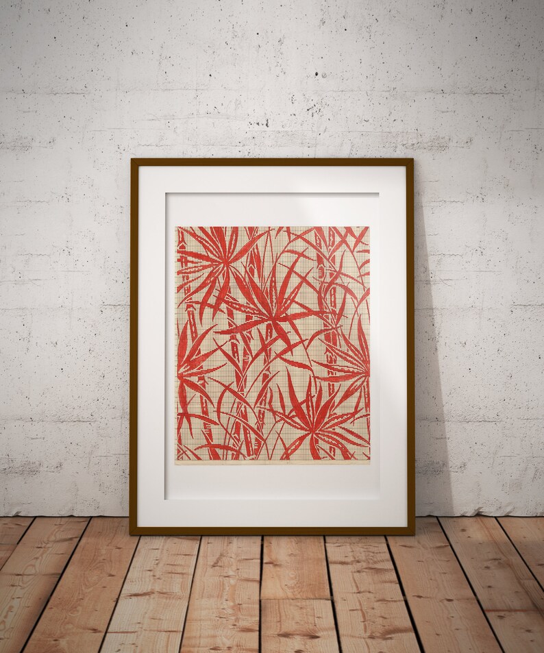 May include: A framed print of a red and white botanical illustration of palm leaves and bamboo stalks. The print is on a beige background and has a white mat.