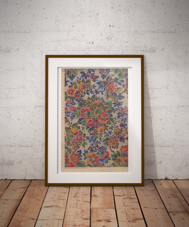 May include: A framed print of a vintage floral pattern with a grid overlay. The pattern features a variety of flowers in shades of pink, red, yellow, blue, and green.