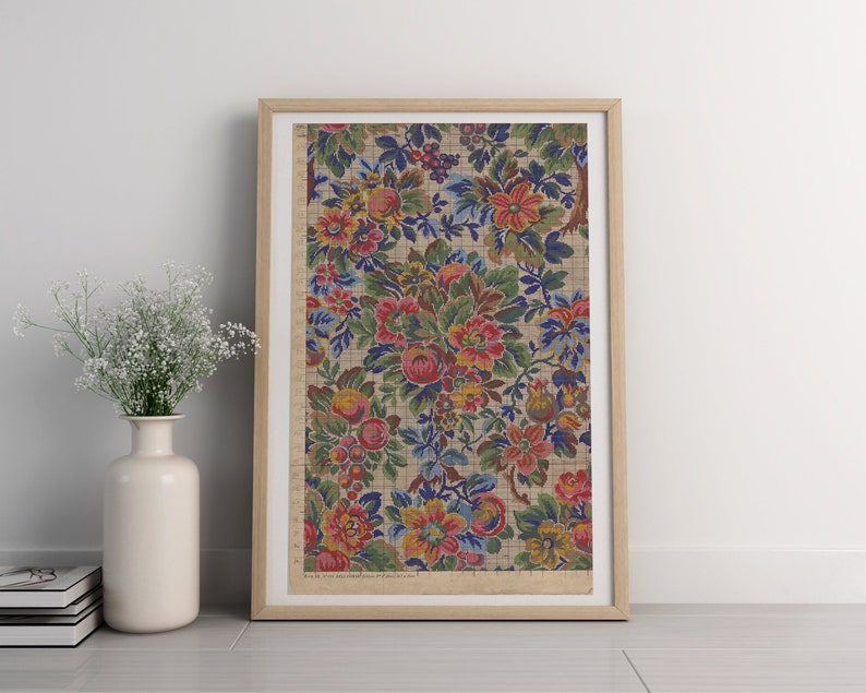 May include: Framed print of a vintage floral pattern with red, pink, blue, yellow, and green flowers on a beige background.