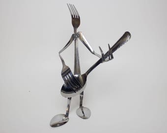 Silverware musician sculpture guitar player