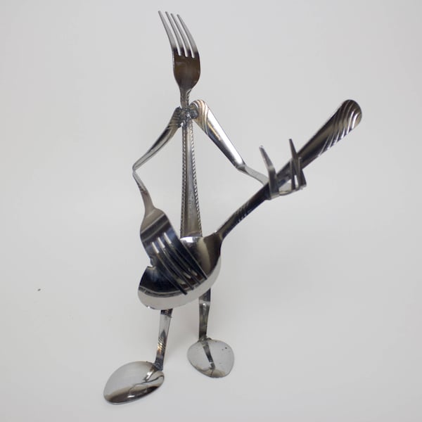 Silverware musician sculpture guitar player