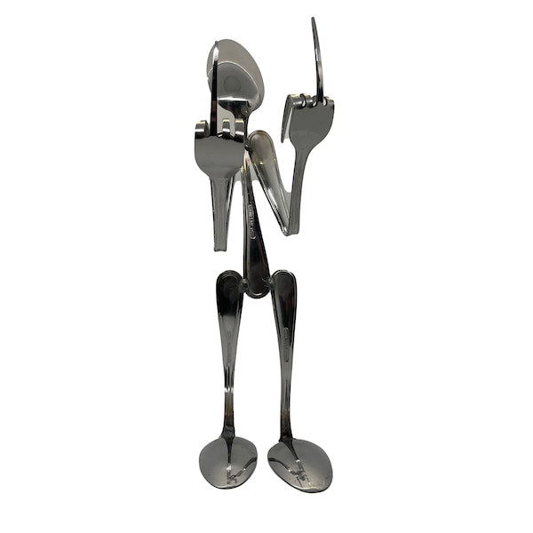 Fork it: Silverware sculpture holding up double middle fingers