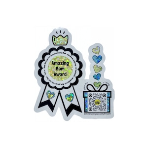 May include: A sparkly gold and silver award ribbon with the text "Amazing Mom Award" and a crown on top. A gift box with a QR code and the text "scan me + I sing smilesongs.com/mom" is below the ribbon. There are five blue and green hearts around the gift box.