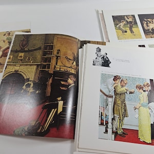 May include: An open book with illustrations of people in various scenes. The book is open to a page with a painting of a man in a brown coat standing on a staircase with two other people. The book is on a white surface.