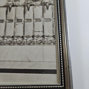 May include: Black and white framed photograph of a vintage soda fountain with multiple taps. The sign reads "Claret Punch 15¢". The frame is silver and gold with a beaded border. The image is a close-up of the fountain.
