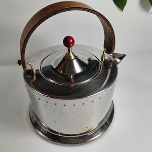 vtg used Bodum stove kettle, designed by C. Jørgensen // stainless steel full size water boiler // made in Italy // bent wood handle