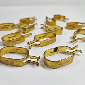 set of 12 vtg bright gold tone metal curtain clips, 0.6 x 1 inch inside the oval