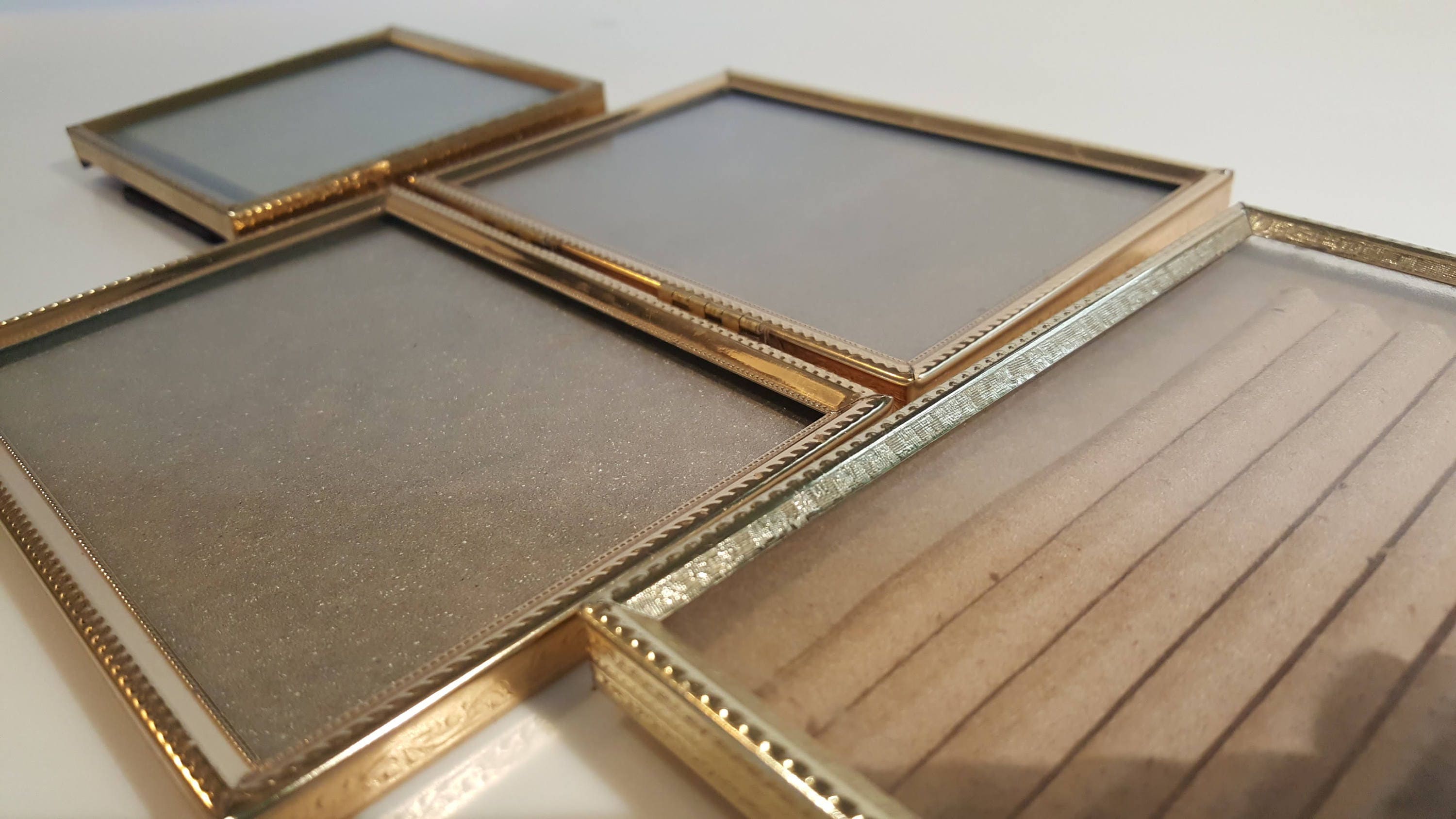Vintage used small gold tone metal picture frames, each sold separate…