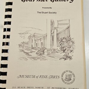 May include: A white ceramic mug with a wraparound design featuring a vibrant, colorful illustration of various mushrooms. The mug has a black handle and a glossy finish. The text "Shroom Queens" is printed on the mug.