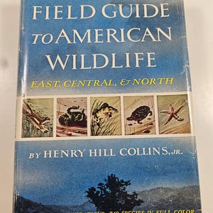 May include: A vintage field guide titled "Complete Field Guide to American Wildlife." The cover is blue with white and yellow text, and illustrations of various animals. The book is by Henry Hill Collins, Jr. and features over 2000 illustrations.