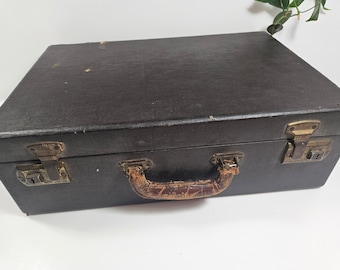 vtg rustic suitcase, 17.5 x 12 x 6 inches // wood covered in paper and paint // leather handle, fabric interior, 2 latches