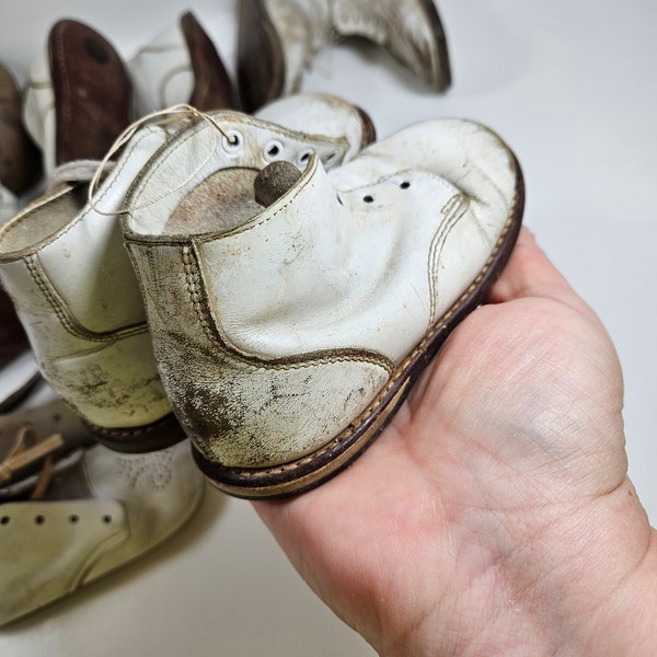 Pair of vintage, worn leather toddler shoes