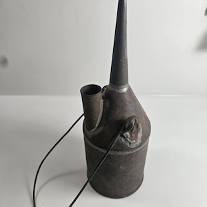 antique primitive tin oil can with handle, tarnished patina // 10 inches tall