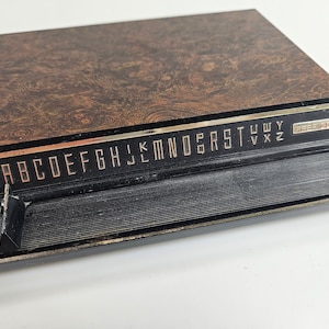 vtg push button address book, hard cover case // 6.5 x 5.75 x 1.5 inches // Park Sherman, made in USA // pages written on mostly pencil