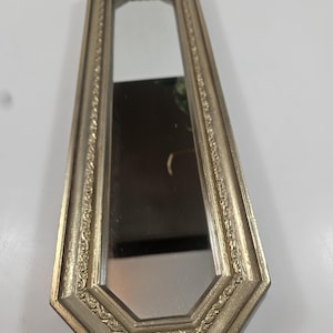 vtg wall mirror, gold faux-wood frame // 17.5 x 5.25 x 1.25 inches // hang either direction
