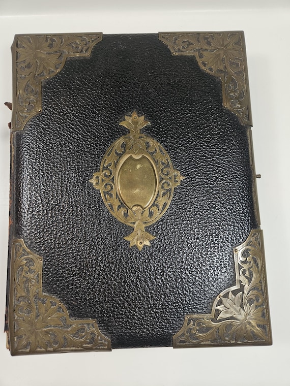 antique Victorian photo album with 47 photos found inside // very worn and used