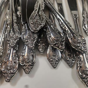 69-piece vintage floral stainless silverware set, Oneida