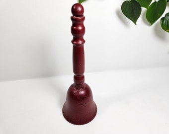 large vtg iron hand bell, 9 inches tall // painted dark red